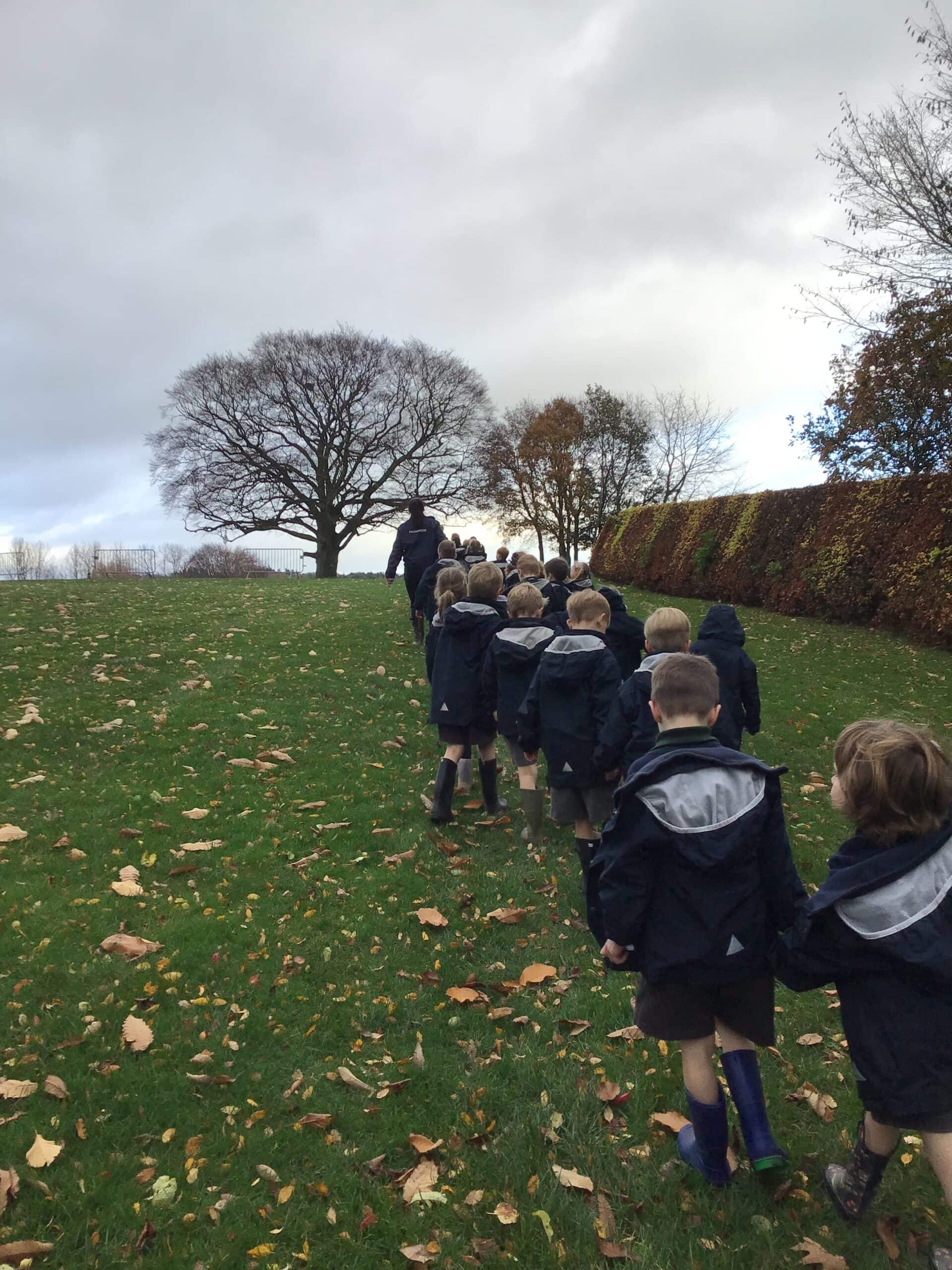Pupils walking through a field